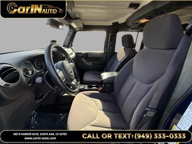 used 2013 Jeep Wrangler Unlimited car, priced at $15,990