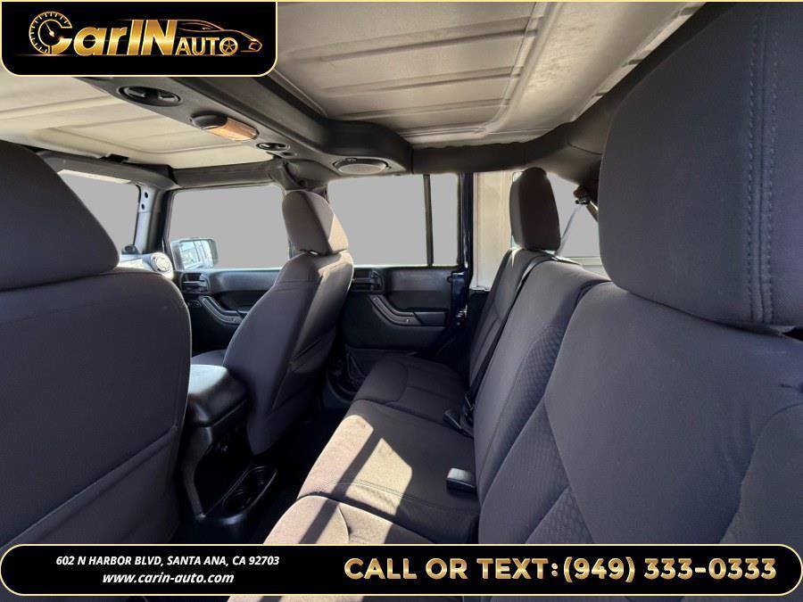 used 2013 Jeep Wrangler Unlimited car, priced at $14,990