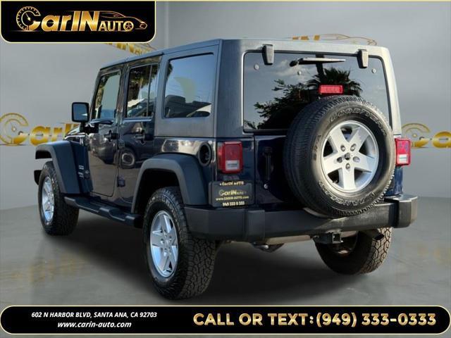 used 2013 Jeep Wrangler Unlimited car, priced at $15,990