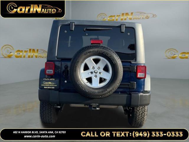used 2013 Jeep Wrangler Unlimited car, priced at $15,990