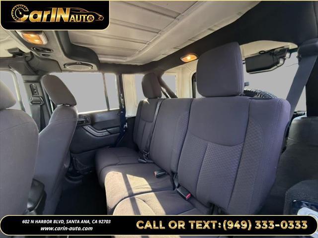 used 2013 Jeep Wrangler Unlimited car, priced at $15,990
