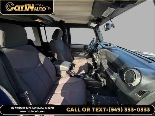 used 2013 Jeep Wrangler Unlimited car, priced at $15,990