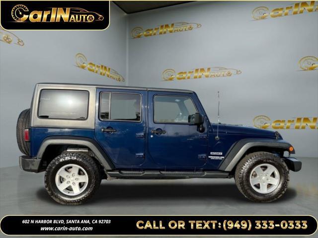 used 2013 Jeep Wrangler Unlimited car, priced at $15,990