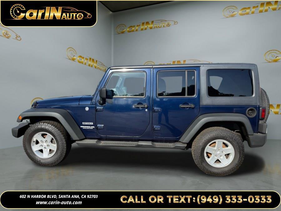 used 2013 Jeep Wrangler Unlimited car, priced at $14,990