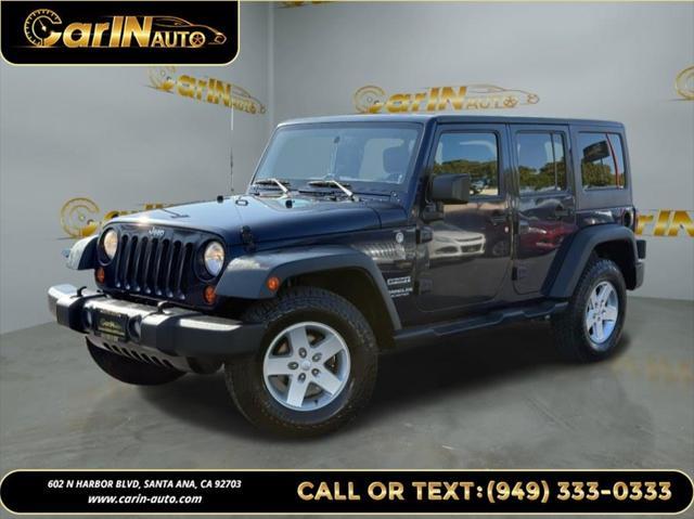 used 2013 Jeep Wrangler Unlimited car, priced at $15,990