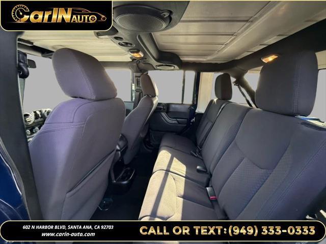 used 2013 Jeep Wrangler Unlimited car, priced at $15,990
