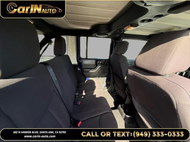 used 2013 Jeep Wrangler Unlimited car, priced at $15,990