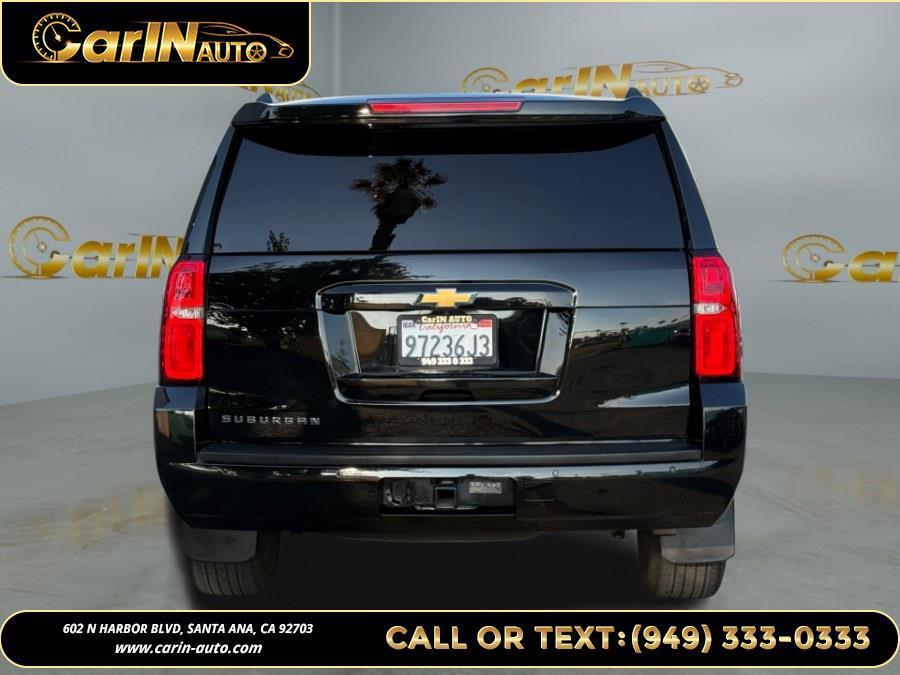 used 2020 Chevrolet Suburban car, priced at $14,990