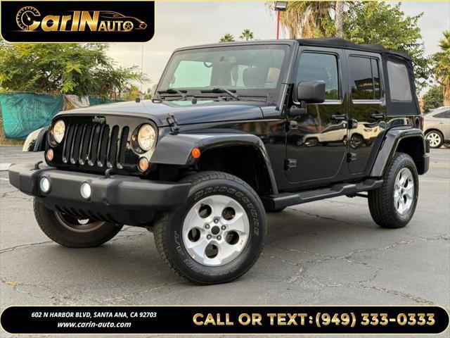 used 2014 Jeep Wrangler Unlimited car, priced at $17,490