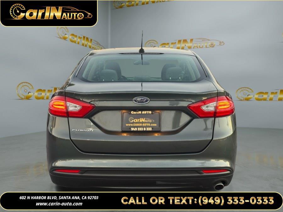 used 2016 Ford Fusion car, priced at $7,990