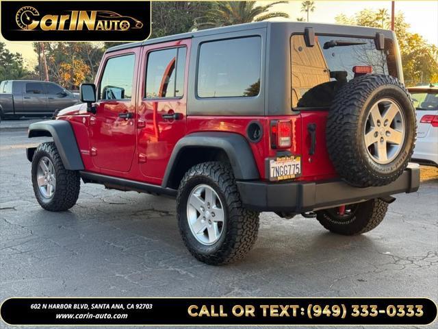 used 2011 Jeep Wrangler Unlimited car, priced at $15,990