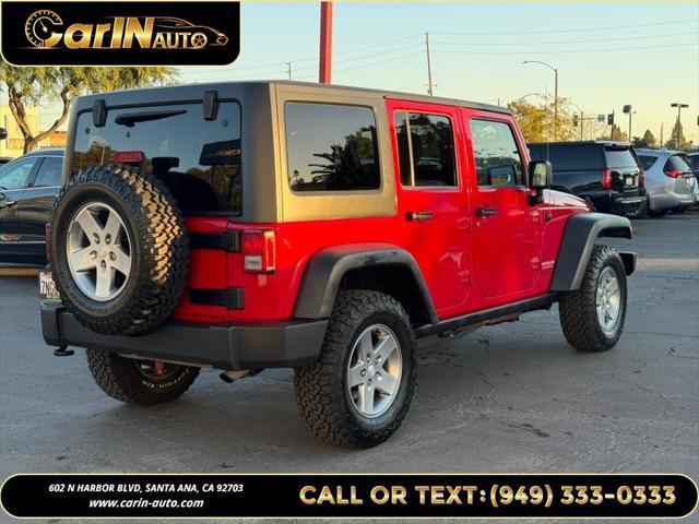 used 2011 Jeep Wrangler Unlimited car, priced at $15,990