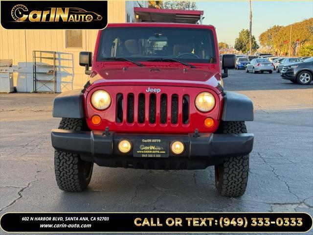 used 2011 Jeep Wrangler Unlimited car, priced at $15,990