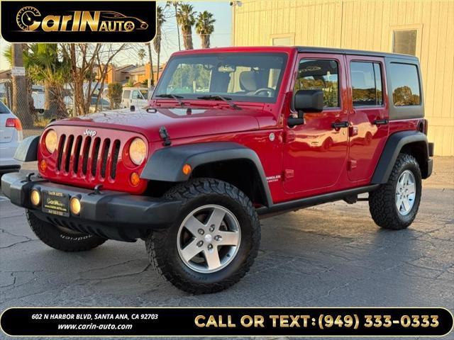 used 2011 Jeep Wrangler Unlimited car, priced at $15,990