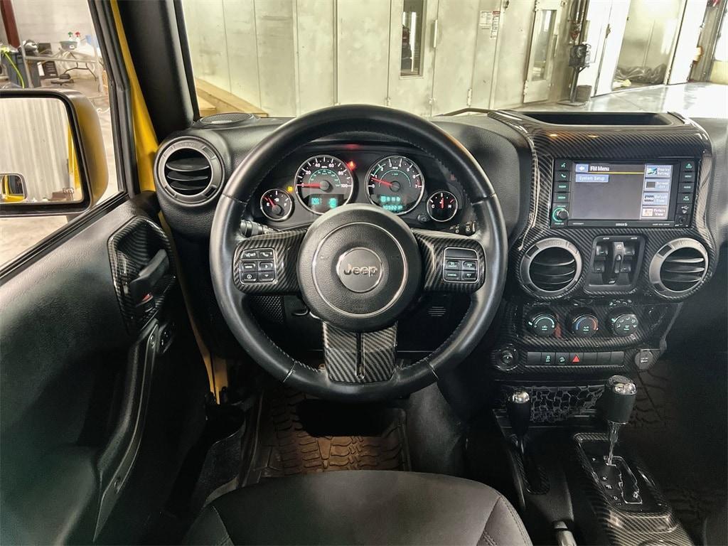 used 2015 Jeep Wrangler Unlimited car, priced at $16,982