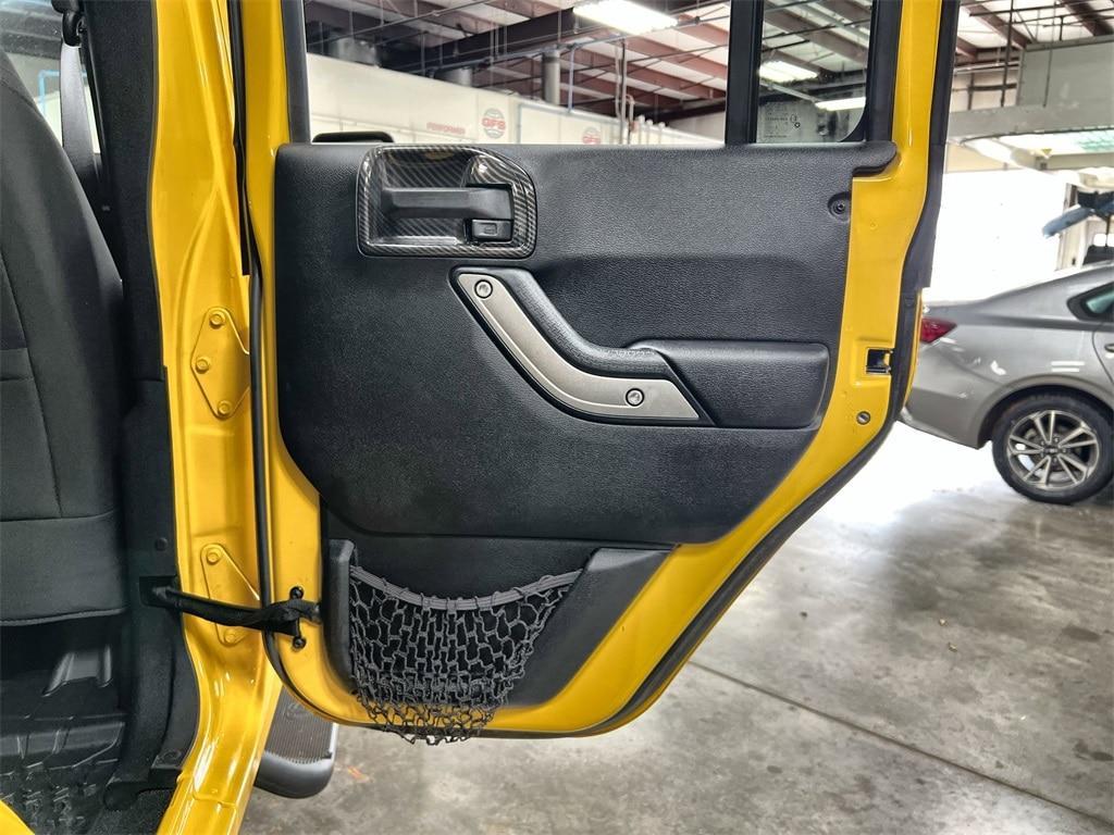 used 2015 Jeep Wrangler Unlimited car, priced at $16,982