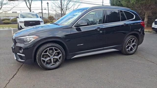 used 2018 BMW X1 car, priced at $14,898