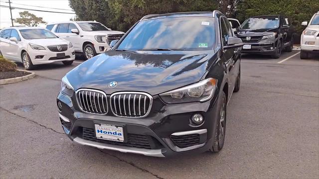 used 2018 BMW X1 car, priced at $14,898