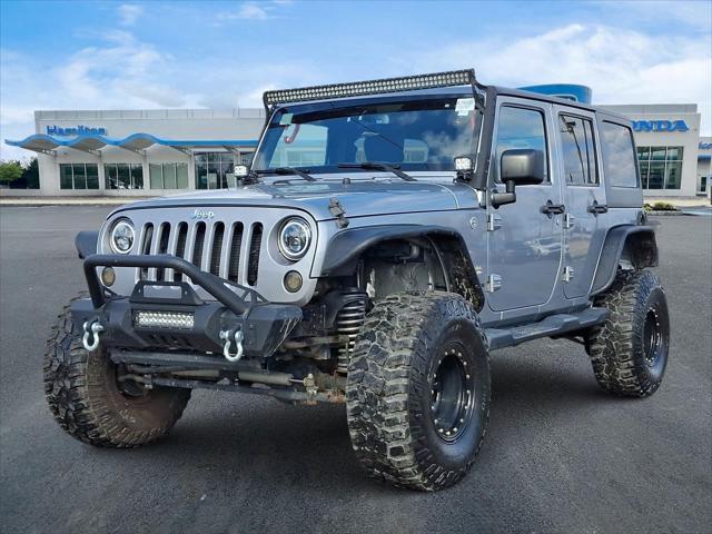 used 2015 Jeep Wrangler Unlimited car, priced at $19,798