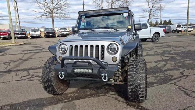 used 2015 Jeep Wrangler Unlimited car, priced at $19,798