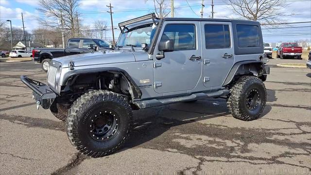 used 2015 Jeep Wrangler Unlimited car, priced at $19,798