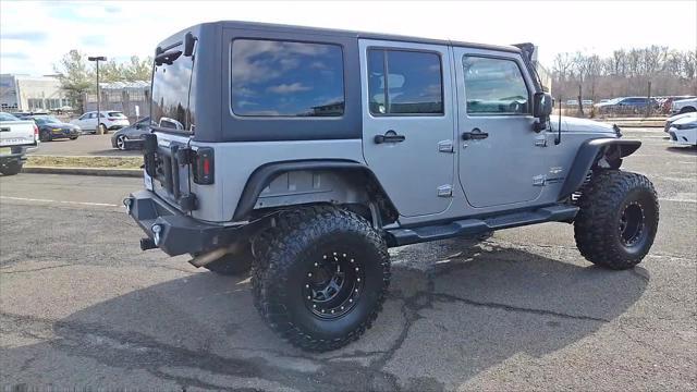 used 2015 Jeep Wrangler Unlimited car, priced at $19,798