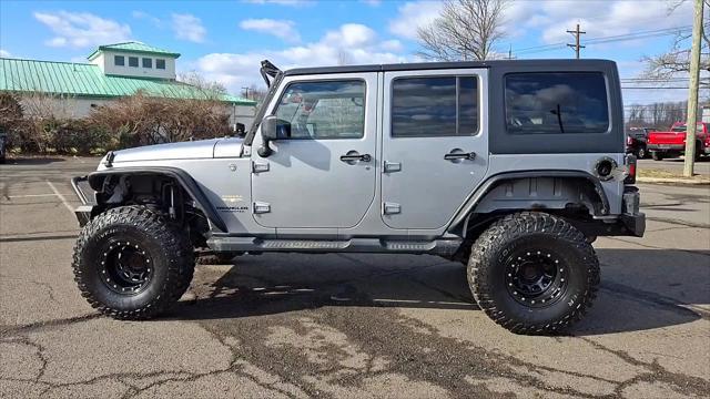 used 2015 Jeep Wrangler Unlimited car, priced at $19,798