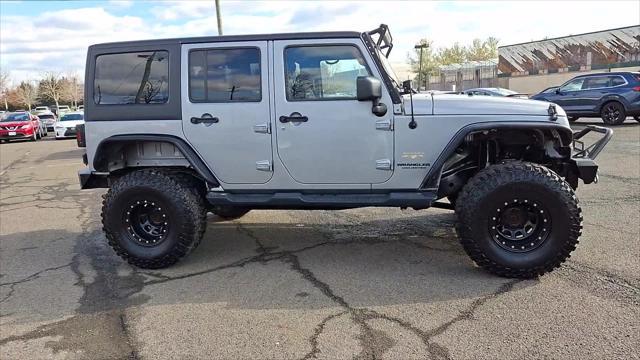 used 2015 Jeep Wrangler Unlimited car, priced at $19,798