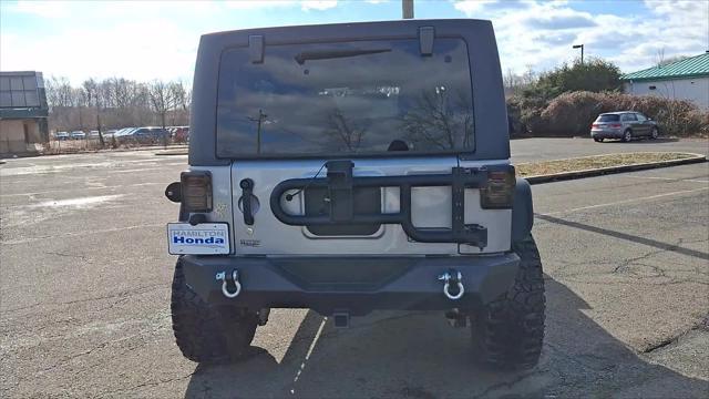 used 2015 Jeep Wrangler Unlimited car, priced at $19,798