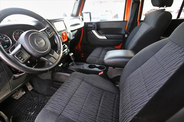 used 2011 Jeep Wrangler Unlimited car, priced at $14,999