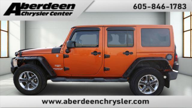 used 2011 Jeep Wrangler Unlimited car, priced at $14,999