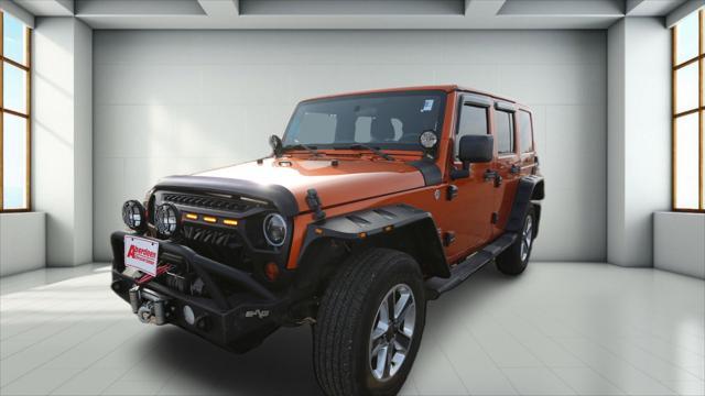 used 2011 Jeep Wrangler Unlimited car, priced at $14,999