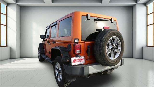 used 2011 Jeep Wrangler Unlimited car, priced at $14,999