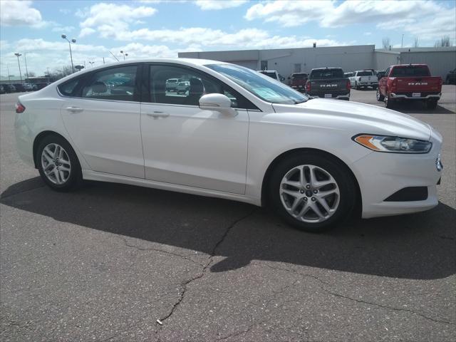 used 2016 Ford Fusion car, priced at $7,999