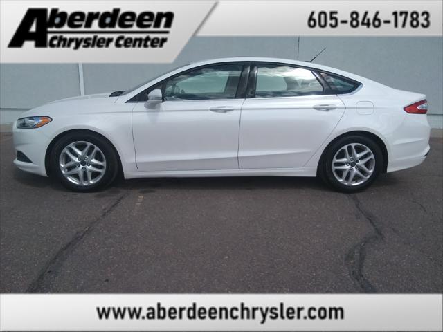 used 2016 Ford Fusion car, priced at $7,999