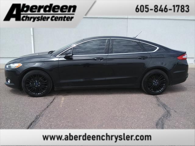 used 2014 Ford Fusion car, priced at $9,999