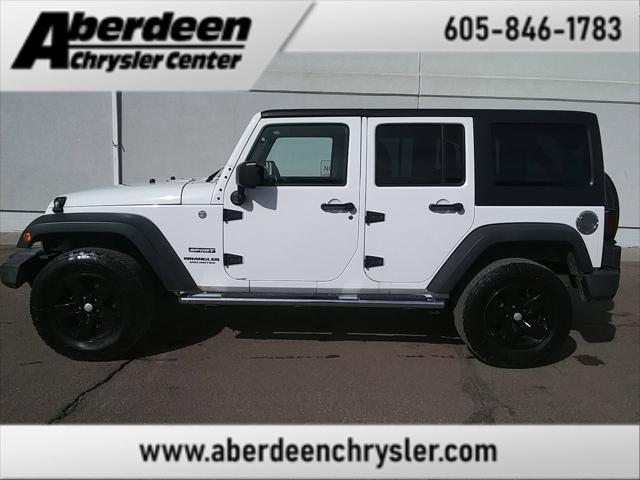 used 2013 Jeep Wrangler Unlimited car, priced at $13,999