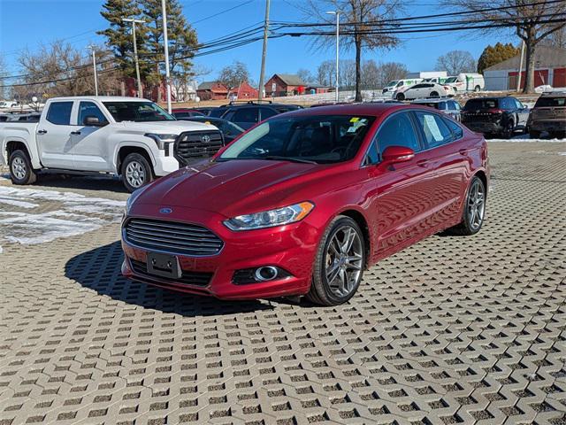 used 2014 Ford Fusion car, priced at $10,000