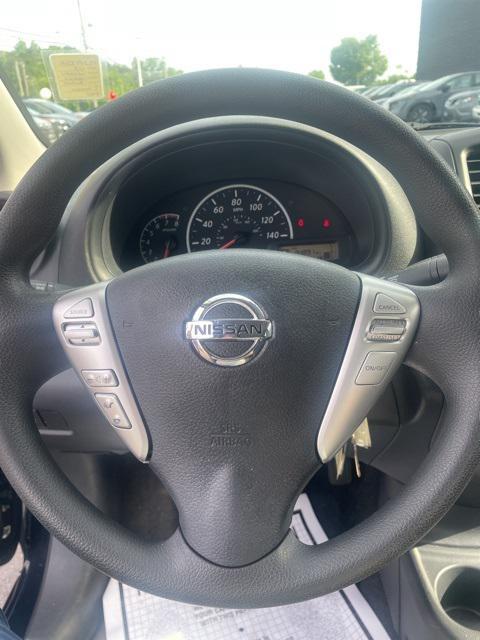 used 2015 Nissan Versa car, priced at $6,000