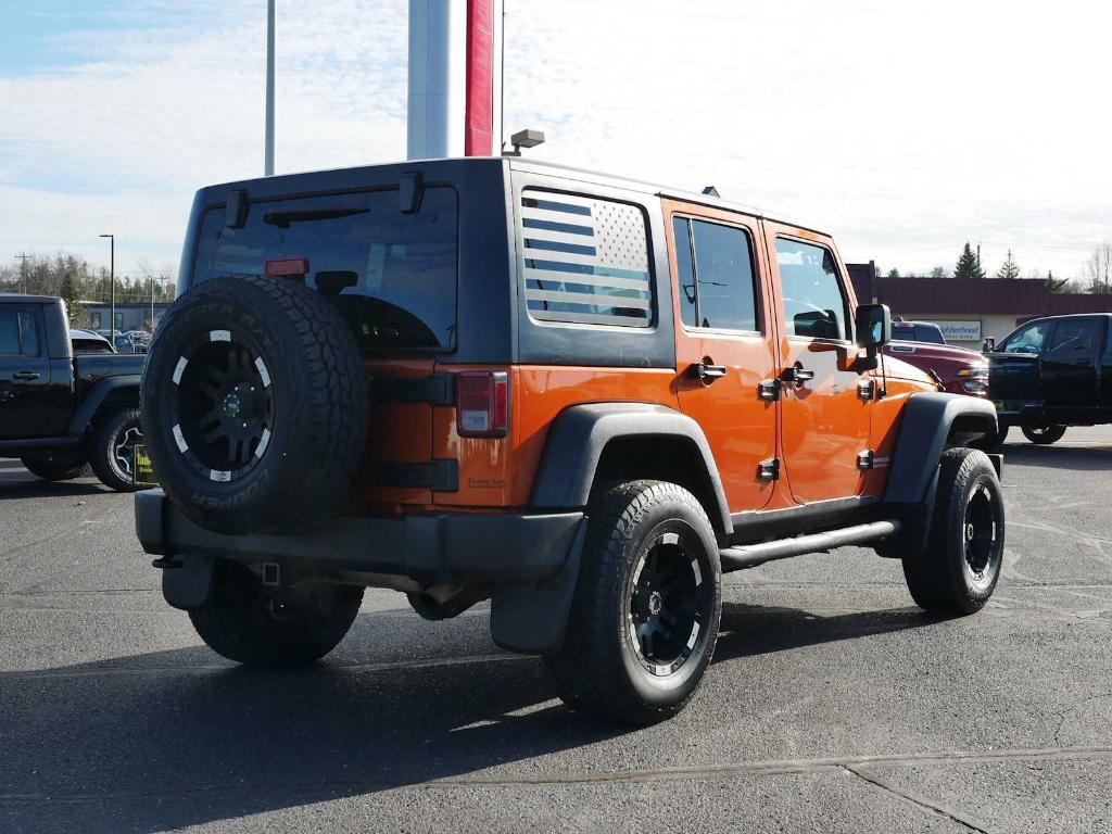 used 2011 Jeep Wrangler Unlimited car, priced at $13,444