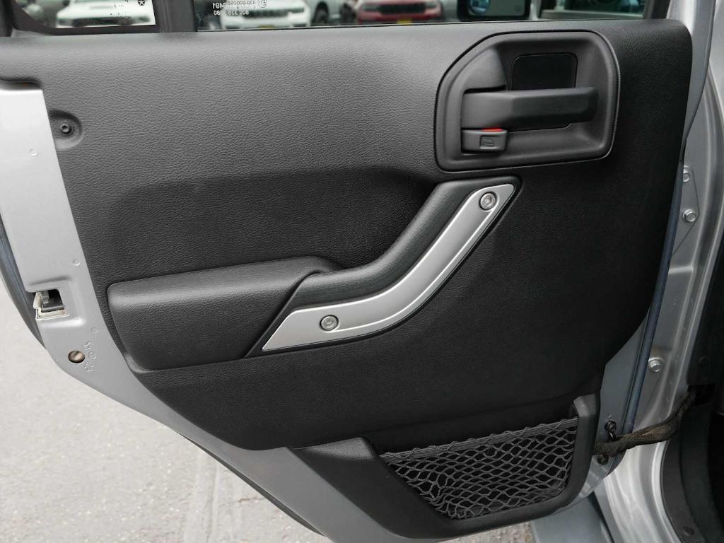 used 2015 Jeep Wrangler Unlimited car, priced at $17,893