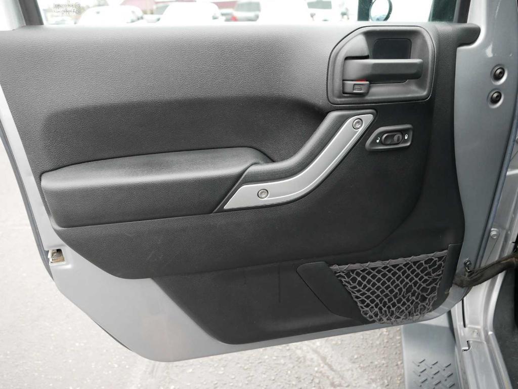 used 2015 Jeep Wrangler Unlimited car, priced at $17,893