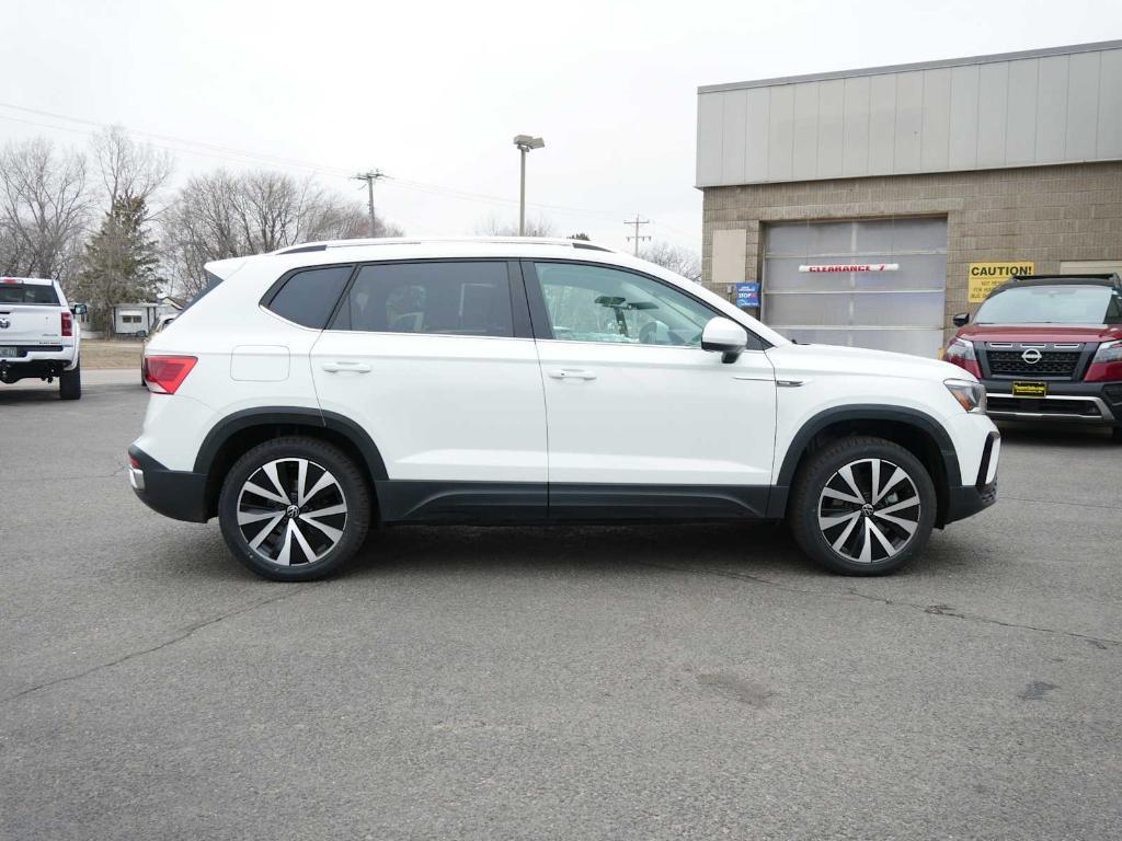 used 2023 Volkswagen Taos car, priced at $22,877