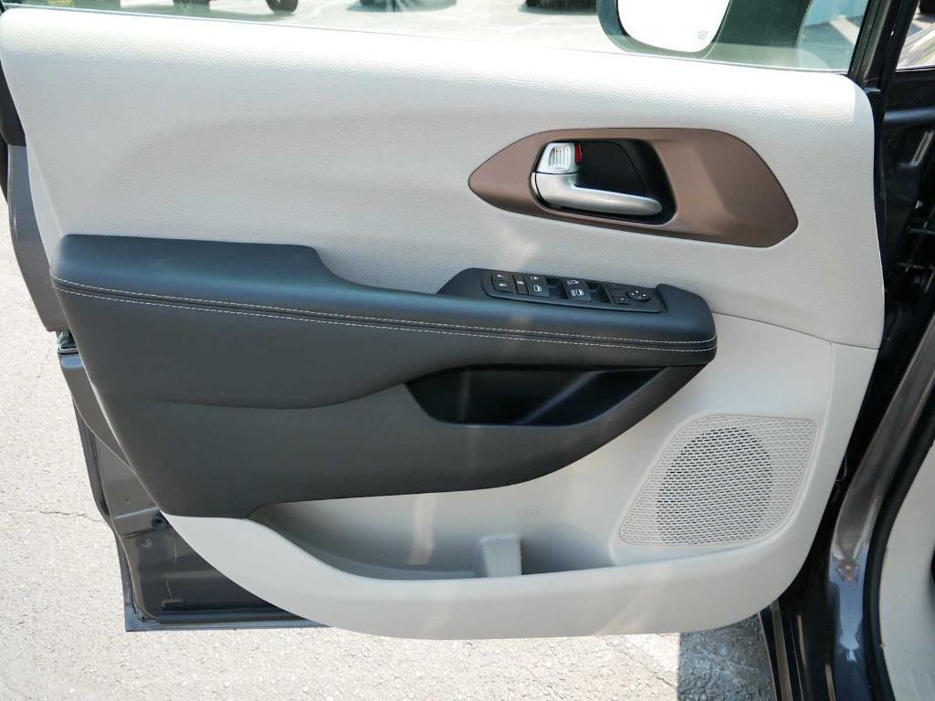 used 2023 Chrysler Voyager car, priced at $22,894