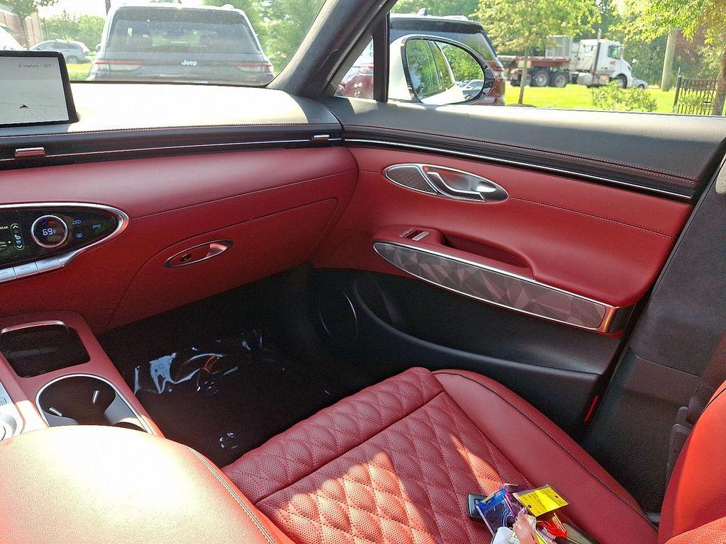 used 2025 Genesis GV70 car, priced at $58,997