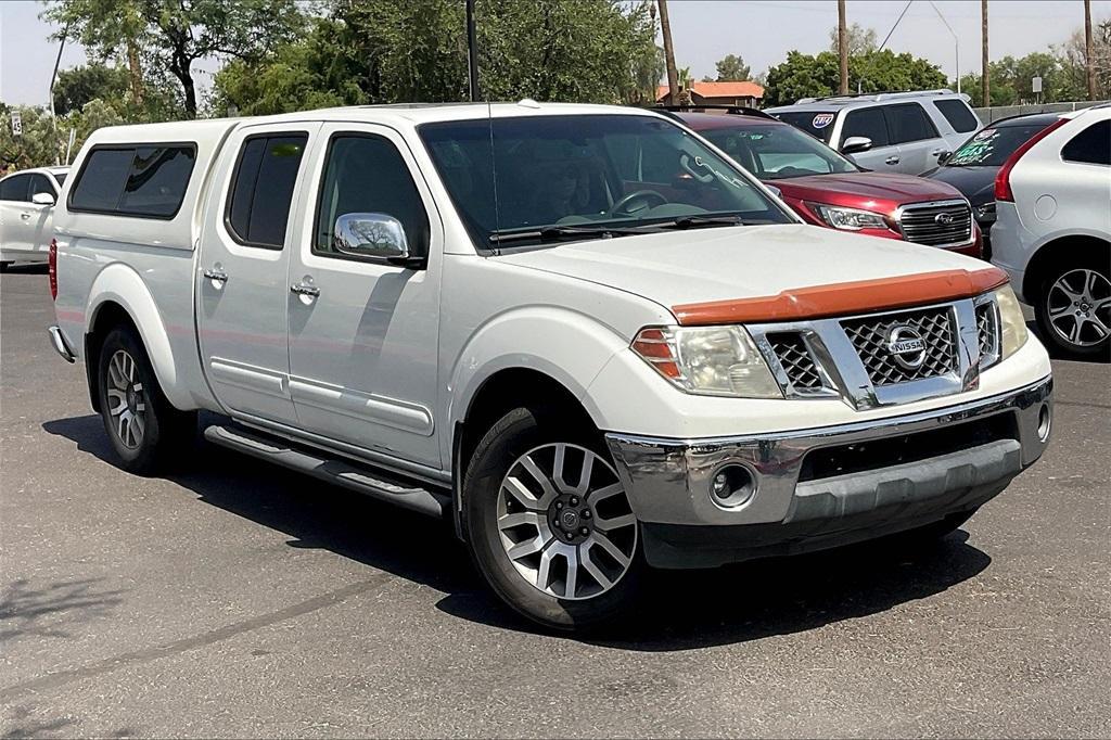 used 2013 Nissan Frontier car, priced at $22,996