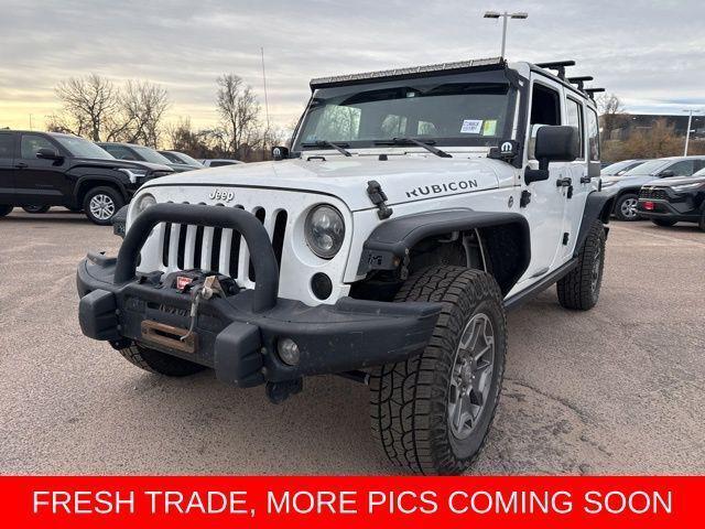 used 2015 Jeep Wrangler Unlimited car, priced at $23,991