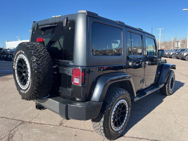 used 2015 Jeep Wrangler Unlimited car, priced at $19,291