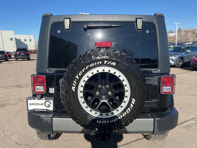 used 2015 Jeep Wrangler Unlimited car, priced at $19,291