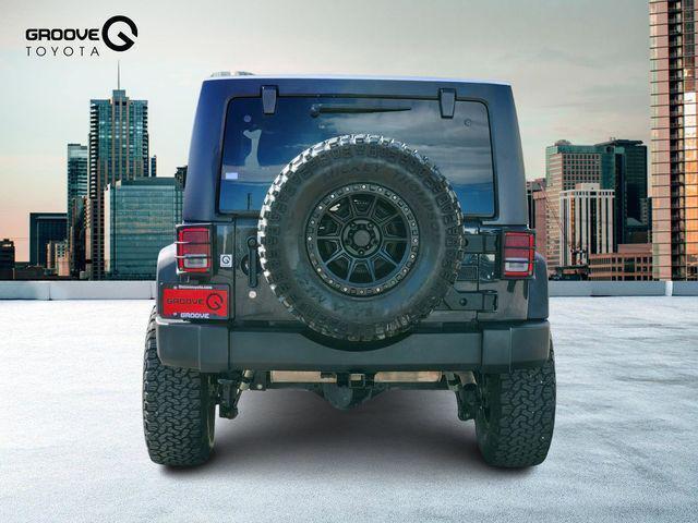 used 2016 Jeep Wrangler Unlimited car, priced at $19,891
